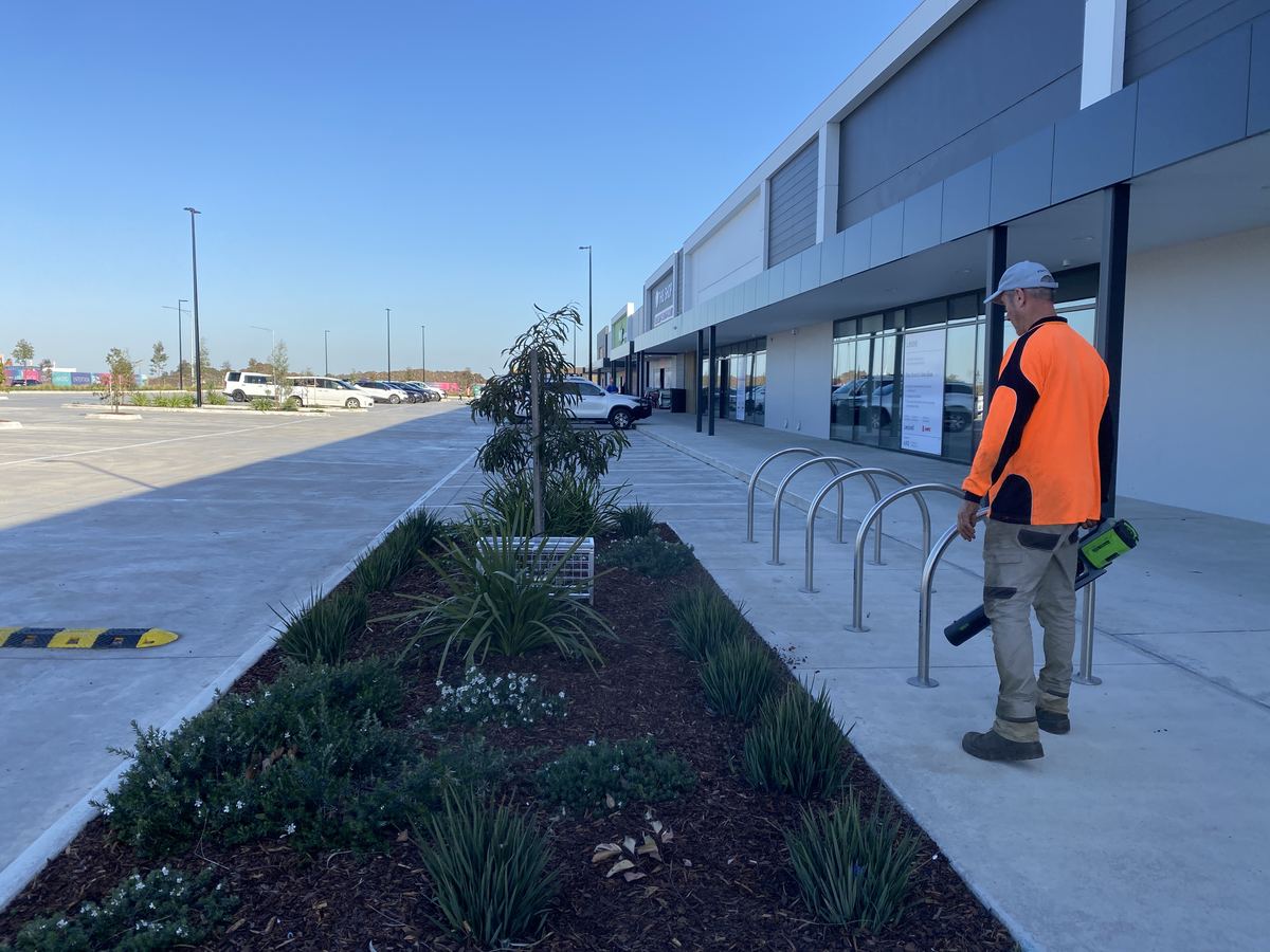 Commercial landscaping — new garden bed at a retail precinct