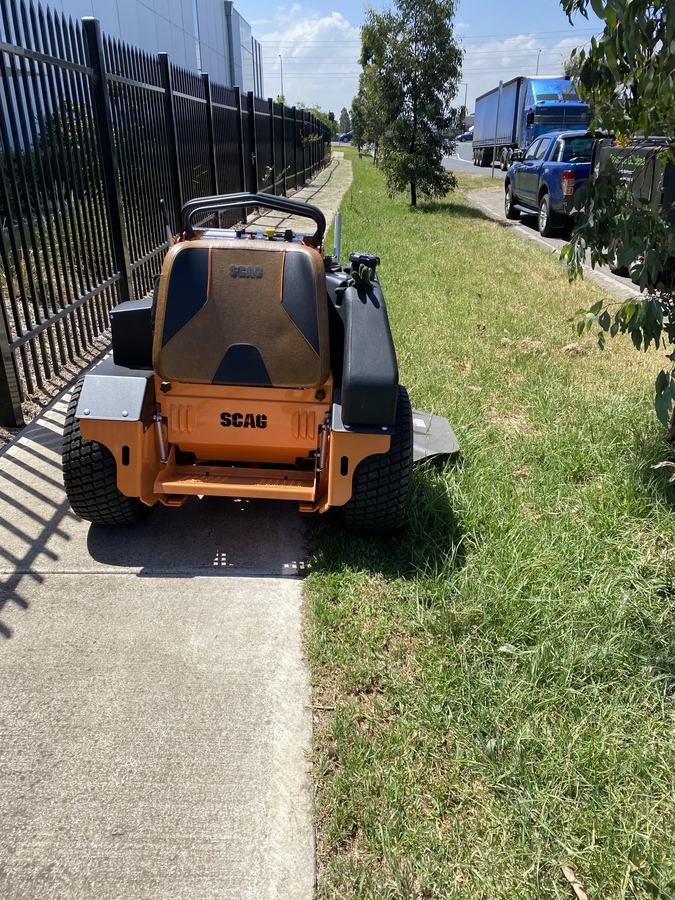 Fence-line mowing — Industrial estate boundary | EcoScape Gardens